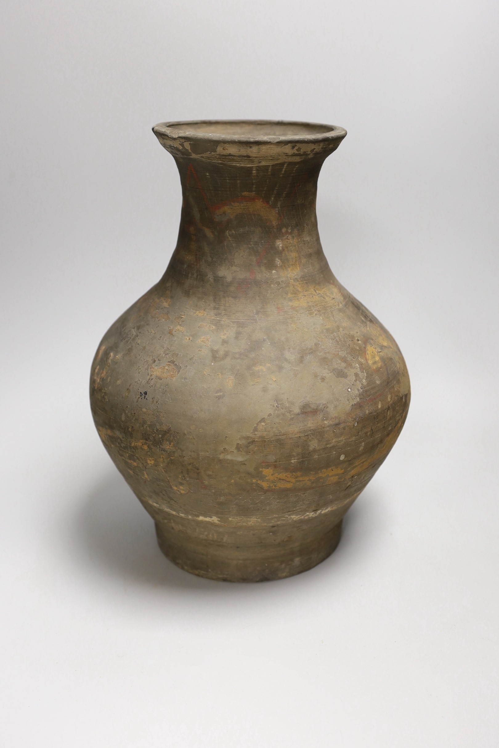 A Chinese pigment painted pottery jar, probably Han dynasty, 32cm
